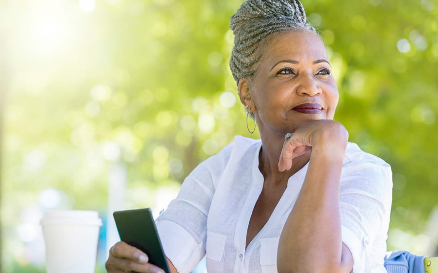 Woman with phone in hand